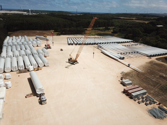 Turbine components rest at an interim storage yard after their arduous sea journey to Australia, prior to making their way to the project site. The facility has been built by local civil contractors Mibusbros at an estimated cost of $1.5 million. 2 turbines have now been fully built with construction of more underway.
