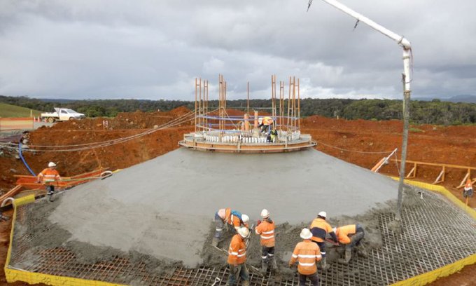 Construction crews successfully complete the first concrete pour for one of the site’s 31 wind turbine foundations.