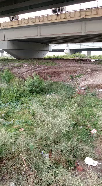 Construction debris dumped in the river in Feb 2020 simply flattened.