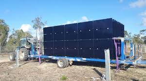 Assembled panels being delivered to field for mounting.