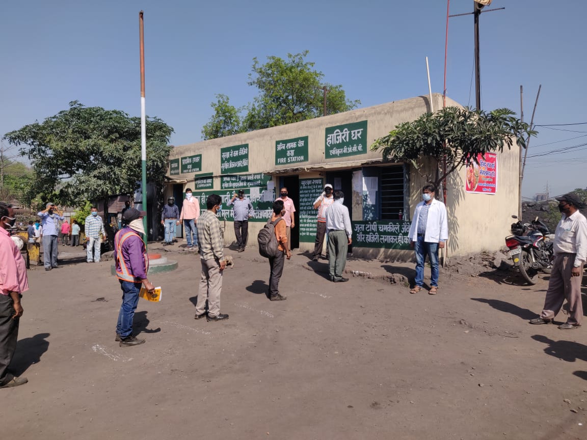 Coal India Ltd. and other mining companies are maintaining Physical Distancing at workplace & following sanitation to prevent the spread of COVID-19. Picture is of workers clocking attendance at Bharat Coking Coal Ltd.'s ABOCP Mine.