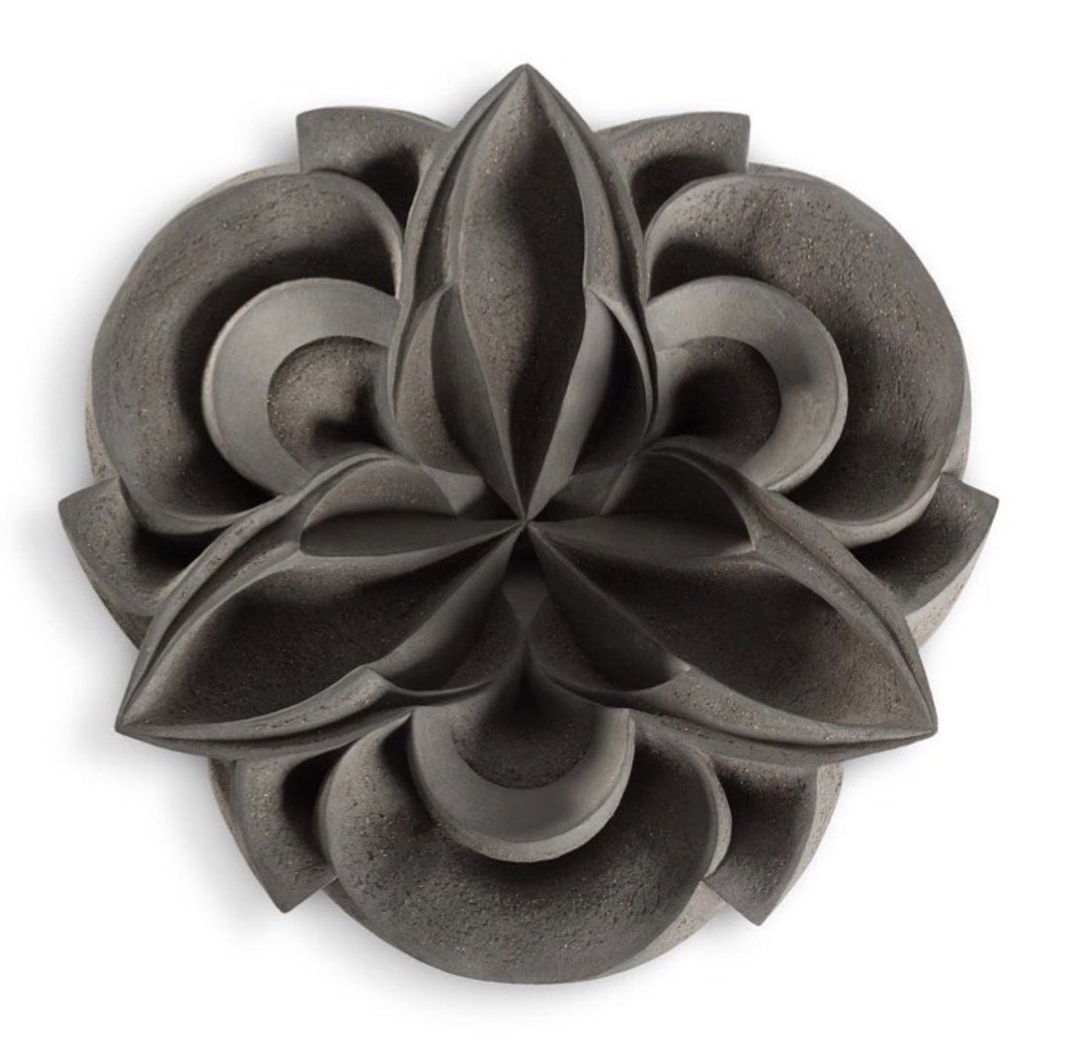 Artist Halima Cassell is one of the UK’s most distinctive and dynamic ceramicists and sculptors. Her work is instantly recognizable due to her bold designs, crisp carving and intuitive understanding inspired by geometry, architecture and nature.
